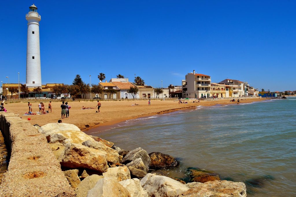 The famous beach of Punta Secca with Commissioner Montalbano's house overlooking the sea directly.